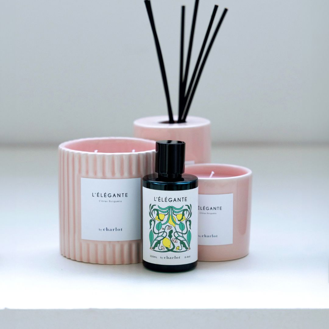 L'Élégante refill bottle, between the L'Élégante diffuser and candles