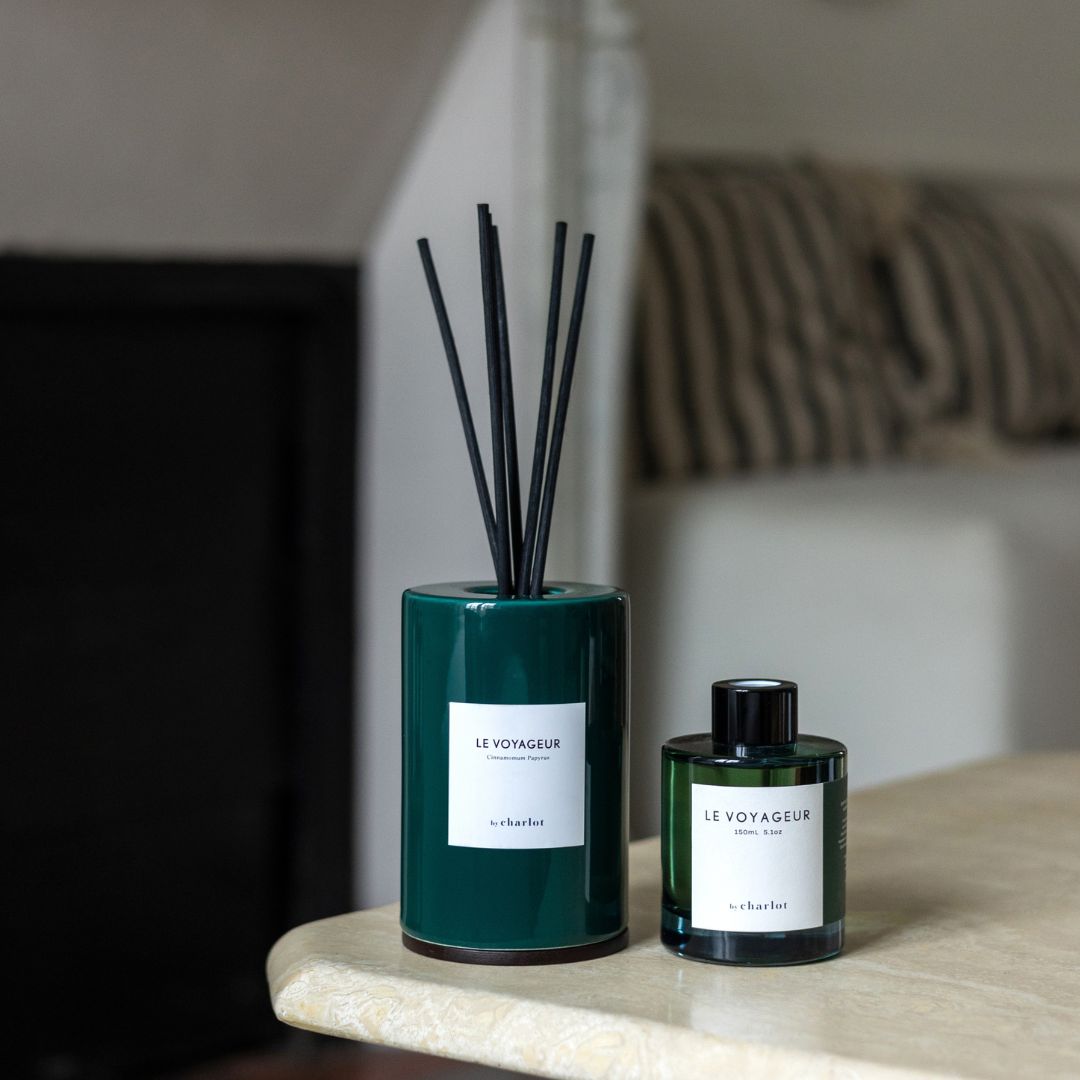 The Le Voyageur refill bottle, next to the Le Voyageur diffuser