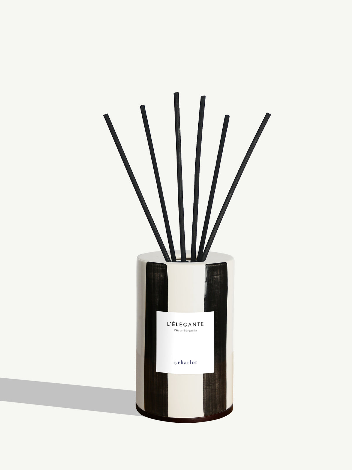 L'Élégante diffuser, liquorice black striped ceramic cloche and rattan reeds